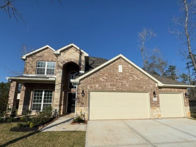 view of front of home with a garage