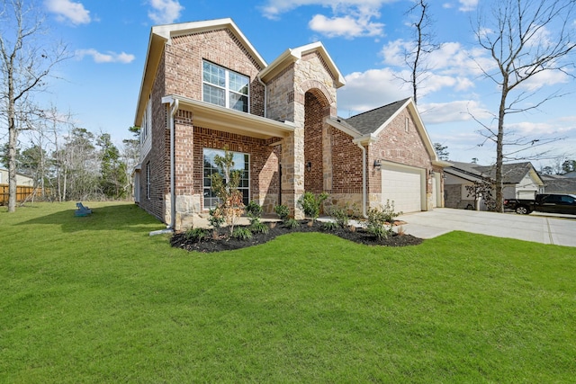 view of front of home with a garage and a front lawn