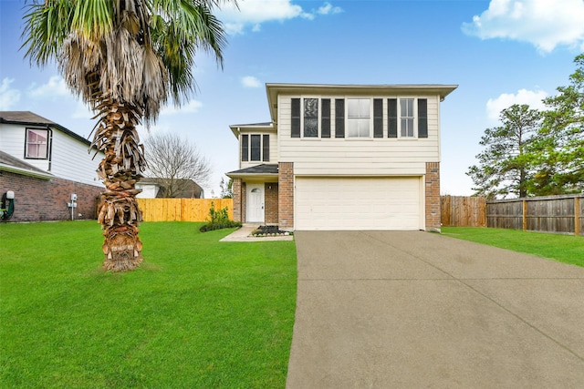 view of front of property featuring a front yard and a garage