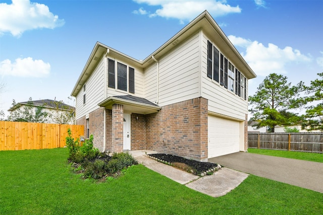 view of front facade with a front lawn and a garage