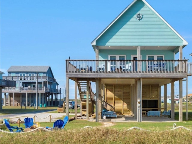 back of property featuring a deck