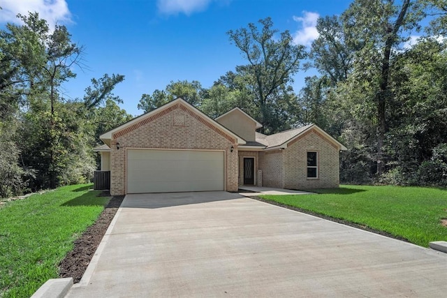 view of front facade with a garage and a front lawn