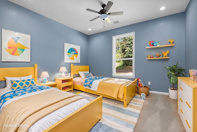 carpeted bedroom with ceiling fan