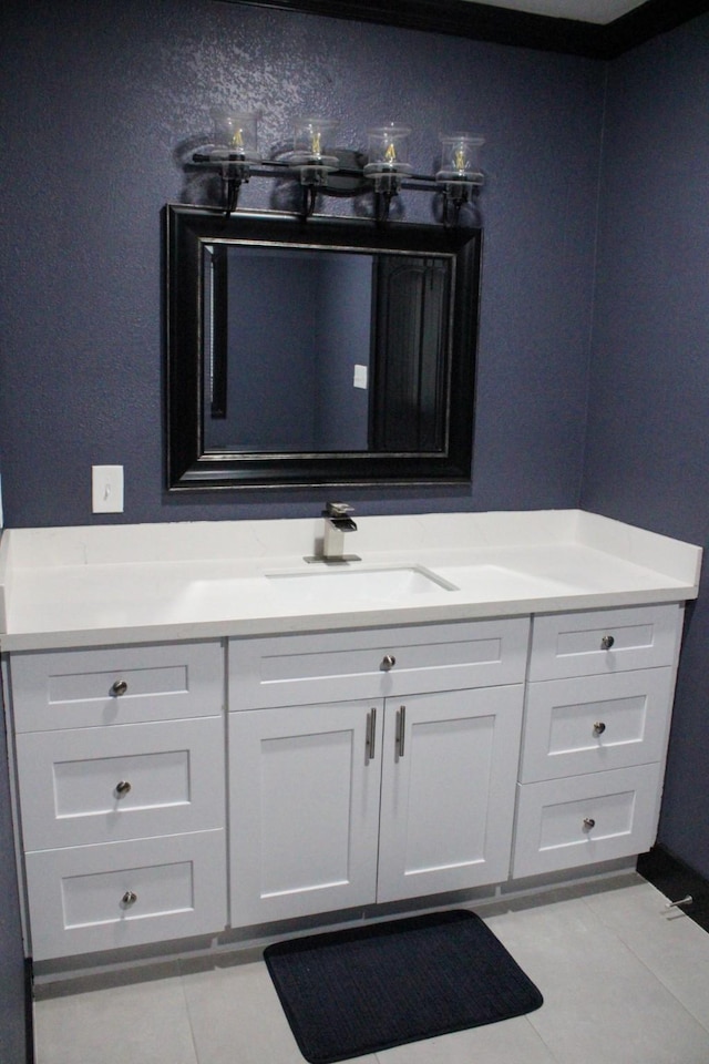 bathroom with vanity and tile patterned flooring