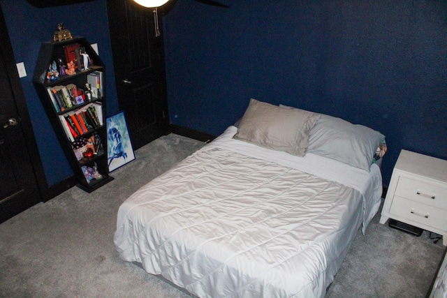 bedroom featuring carpet