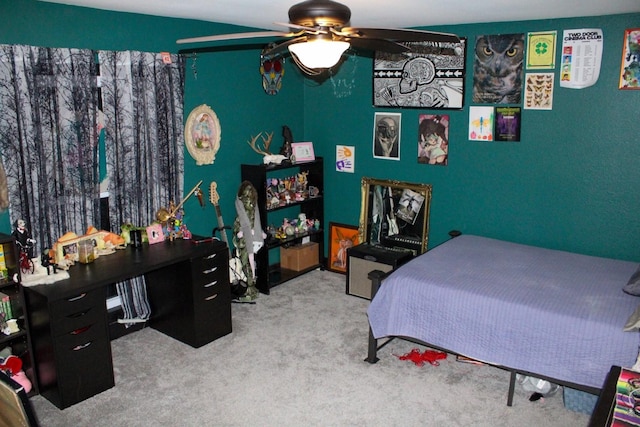 carpeted bedroom featuring ceiling fan