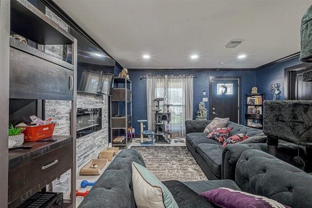 606 S Kaufman Dr, Deer Park, TX 77536 - living room with visible vents, crown molding, and recessed lighting