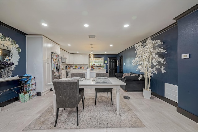 606 S Kaufman Dr, Deer Park, TX 77536 - dining room featuring recessed lighting, visible vents, and ornamental molding