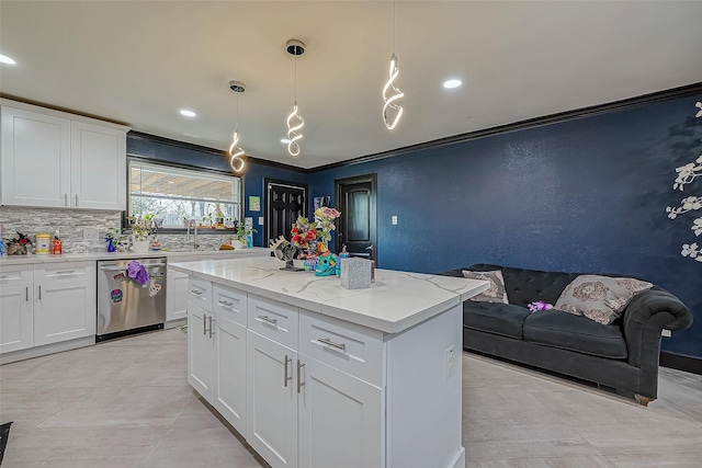 606 S Kaufman Dr, Deer Park, TX 77536 - kitchen with decorative backsplash, dishwasher, a kitchen island, open floor plan, and decorative light fixtures