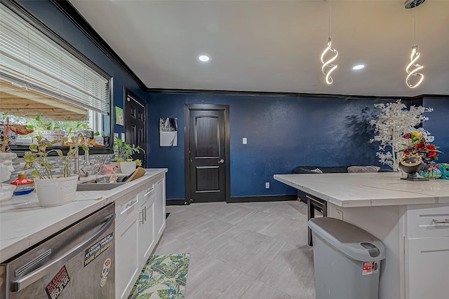 606 S Kaufman Dr, Deer Park, TX 77536 - kitchen with white cabinets, dishwasher, ornamental molding, light stone countertops, and pendant lighting