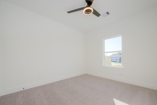 unfurnished room with carpet and ceiling fan