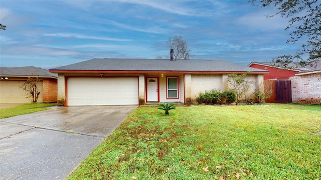 ranch-style home with a front yard and a garage