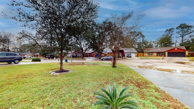 view of yard with a garage