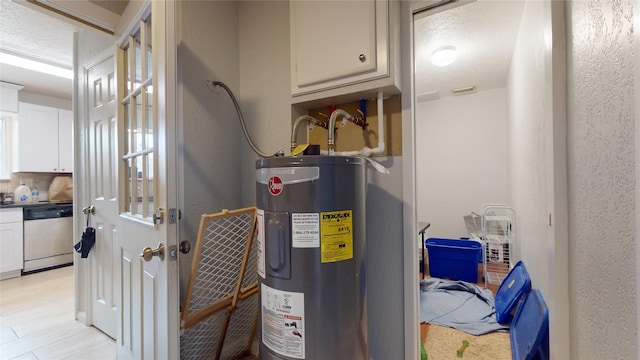 utility room featuring electric water heater