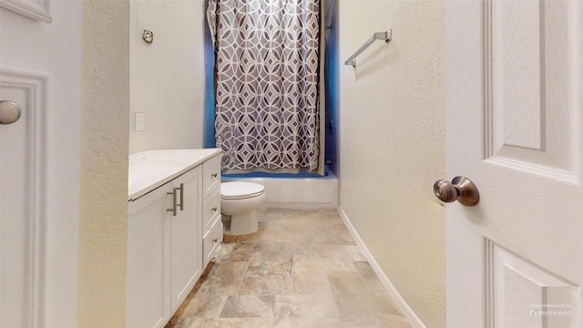 full bathroom featuring vanity, toilet, and shower / bath combo