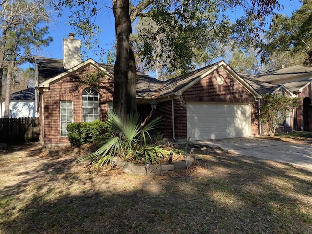 ranch-style home featuring a garage