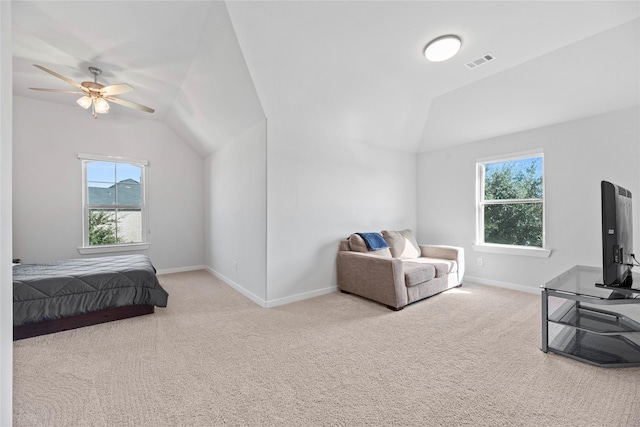 carpeted bedroom featuring ceiling fan and lofted ceiling