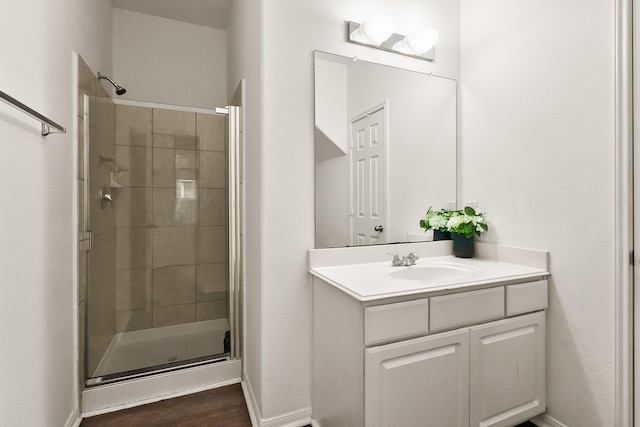 bathroom with vanity and walk in shower