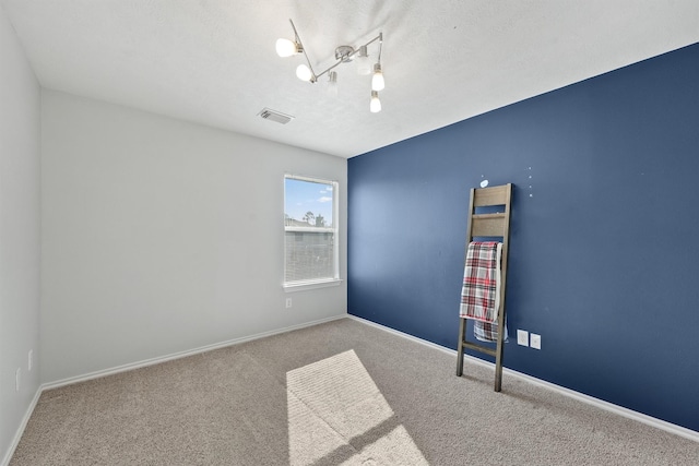 spare room with carpet flooring