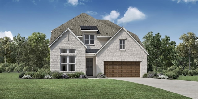 view of front facade featuring a front yard and a garage