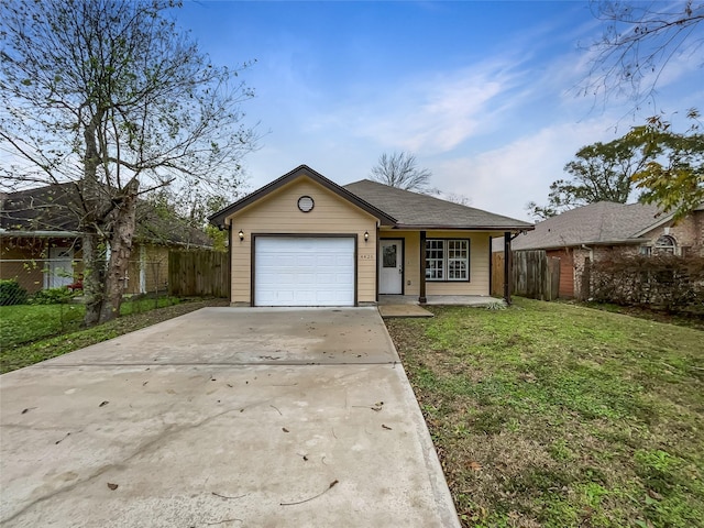 ranch-style home with a front yard and a garage