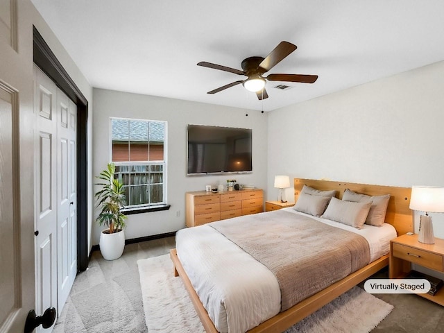 bedroom with a closet and ceiling fan