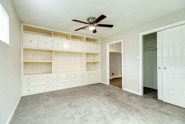 unfurnished bedroom with light colored carpet and ceiling fan