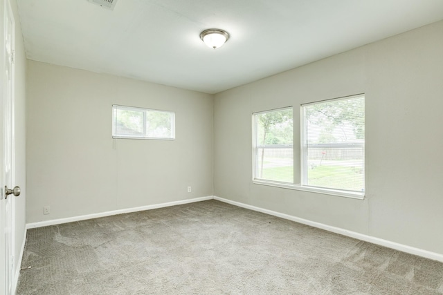 spare room with carpet flooring