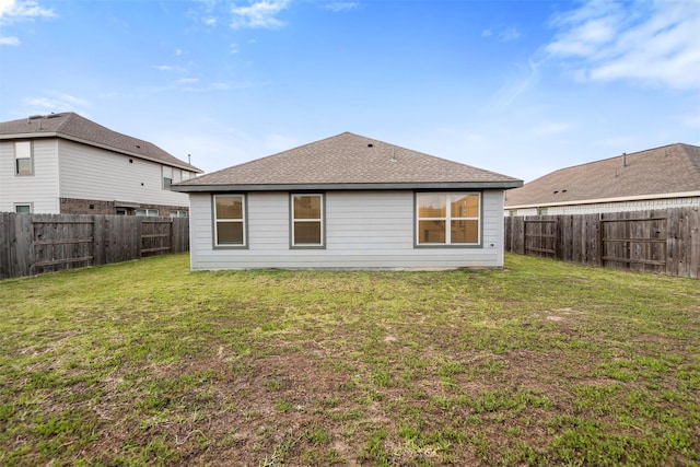 14534 Broadbury Pond Rd, Rosharon, TX 77583 - back of house featuring roof with shingles