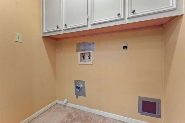 laundry room with cabinets, washer hookup, and electric dryer hookup