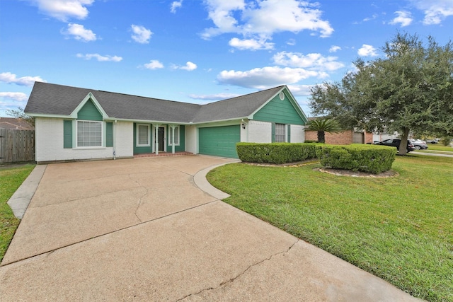 single story home with a garage and a front lawn