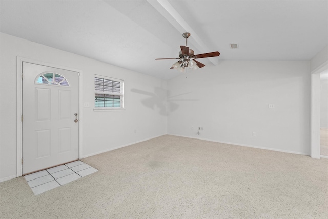 carpeted entryway featuring vaulted ceiling with beams and ceiling fan