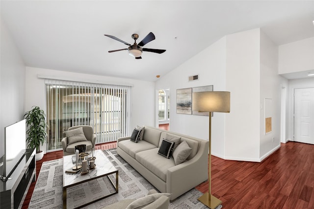 living room featuring ceiling fan, dark hardwood / wood-style flooring, and high vaulted ceiling