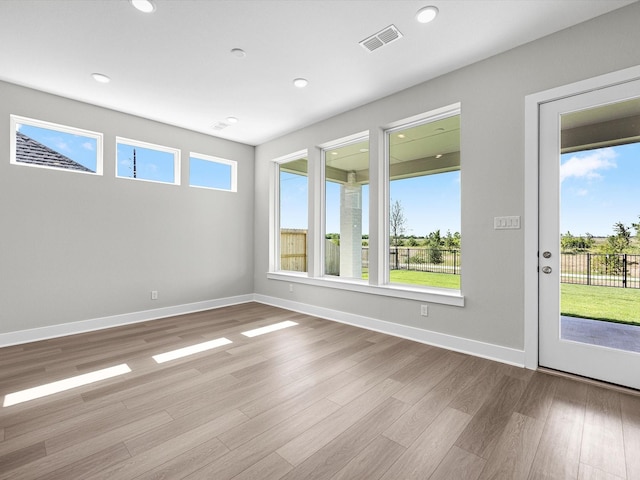 empty room featuring light hardwood / wood-style floors