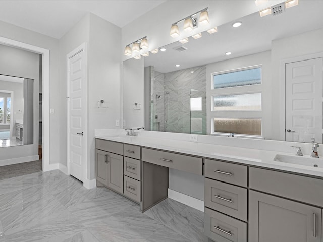 bathroom with vanity and an enclosed shower