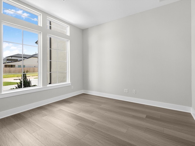 empty room featuring hardwood / wood-style floors