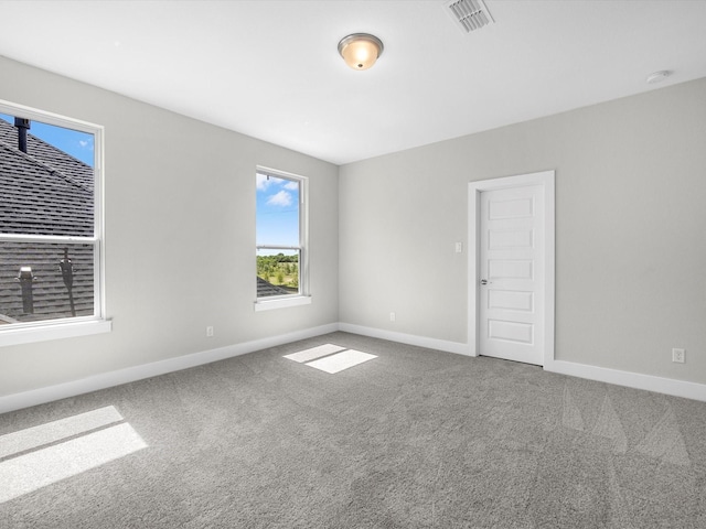 view of carpeted spare room