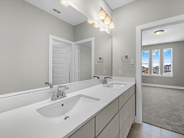 bathroom featuring tile patterned floors and vanity