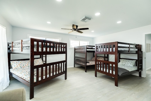 bedroom featuring ceiling fan and light wood-type flooring