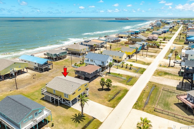 aerial view featuring a beach view and a water view