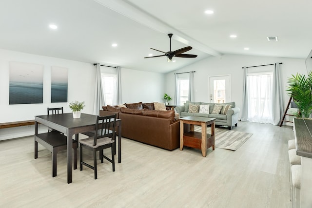 living room featuring vaulted ceiling with beams, ceiling fan, and light hardwood / wood-style flooring