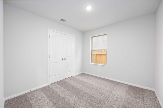 view of carpeted spare room