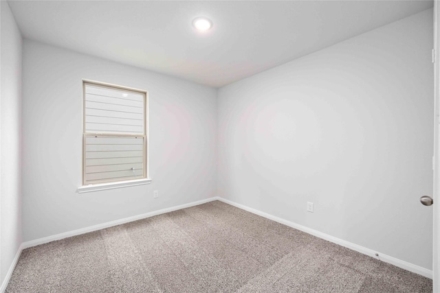 unfurnished room featuring carpet floors