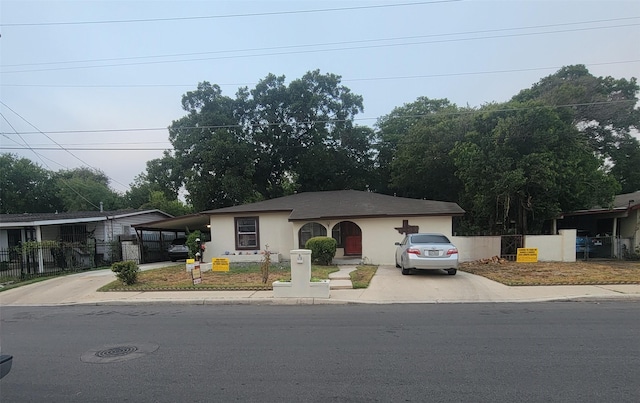 view of front facade with a carport