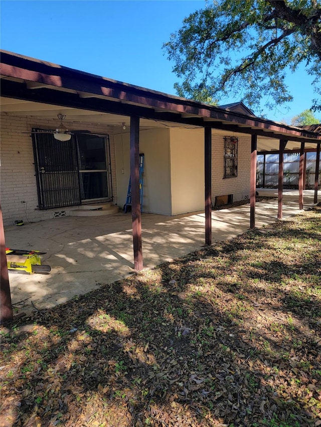 rear view of property with a patio