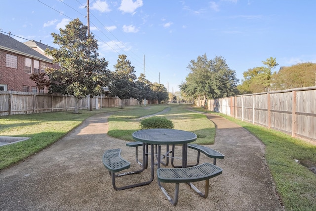 view of community with a yard