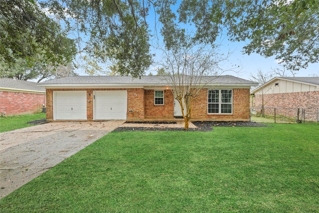 ranch-style home featuring a garage and a front lawn