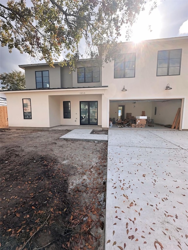 rear view of house featuring a patio area