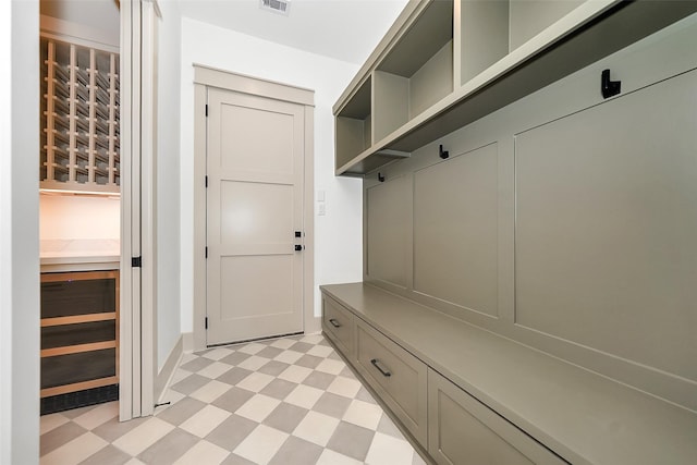 mudroom with visible vents and light floors