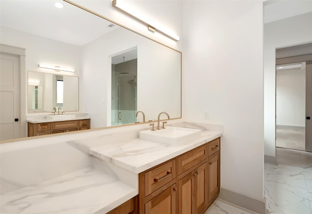 full bath featuring marble finish floor, a stall shower, vanity, and baseboards